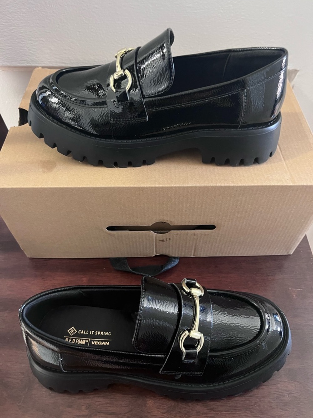 Call It Spring Black Patent Lug Sole Loafers with Gold Bit